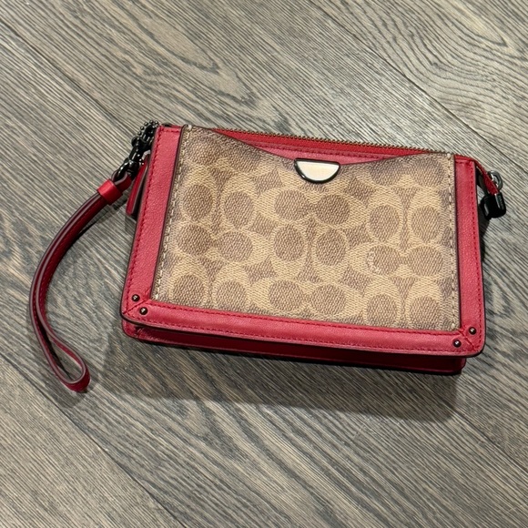 Coach Handbags - Coach Signature Canvas Dreamer Wristlet with Red Leather Trim. EUC